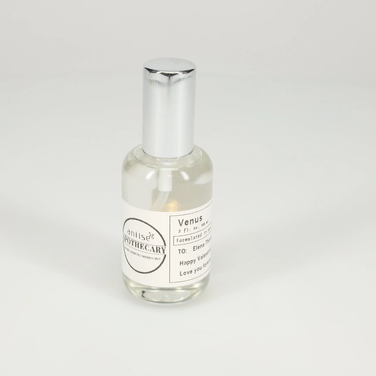 Aniise Apothecary Venus Fragrance Oil 2 fl oz - clear glass spray bottle with silver cap and personalized gift label